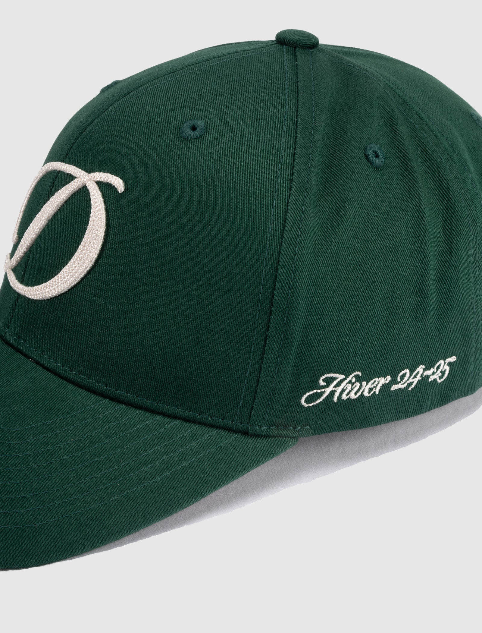 CURSIVE D CAP