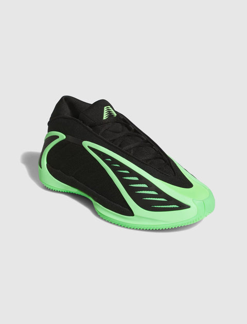 Black and neon green men's streetwear sneaker with mesh and reflective accents