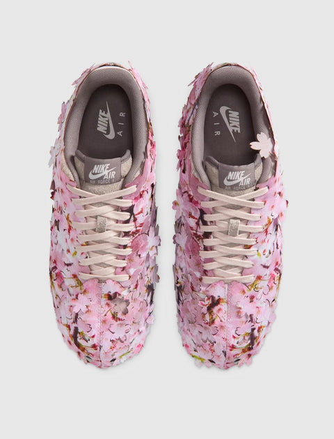Nike Air Force 1 Low sneakers with pink cherry blossom floral design, top view