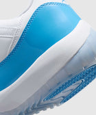 Close-up of white and blue sneaker heel with patent leather and icy rubber sole