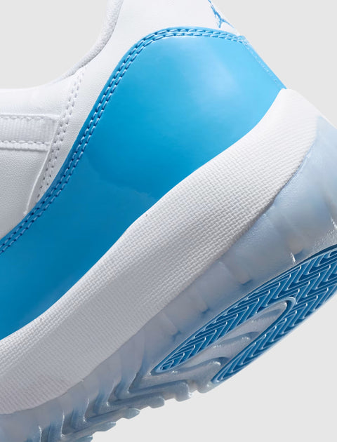 Close-up of white and blue sneaker heel with patent leather and icy rubber sole