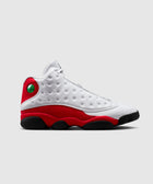 White and red high-top sneaker with black sole and green holographic detail