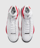 Top view of white and red leather sneakers with black accents and 'JORDAN' label on tongues
