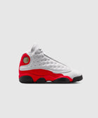 White and red high-top sneaker with black sole on a plain background