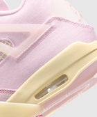 Close-up of pink suede sneaker with translucent accents and cream midsole