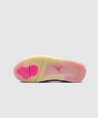 Translucent sneaker outsole with pink highlights and visible logo on a grey background