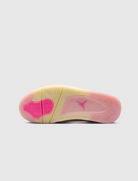 Translucent sneaker outsole with pink highlights and visible logo on a grey background