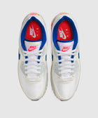 Pair of white Nike Air Max sneakers with blue and red accents, top view