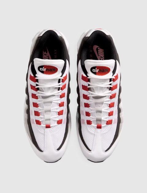 White and red mesh sneakers with black accents, top view, air max label visible