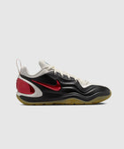 Low-top black and white sneaker with red Nike swoosh, gum sole, and textured details