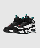 Black and white men's high-top sneakers with teal accents and visible air sole units