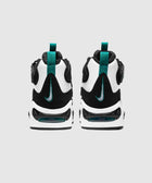Back view of black, white, and teal athletic sneakers with visible air sole and pull tabs