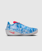 Blue and white marbled low-top sneaker with red accents and Nike logo on a neutral background