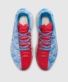 Red and blue athletic sneakers with speckled pattern and blue laces, top view
