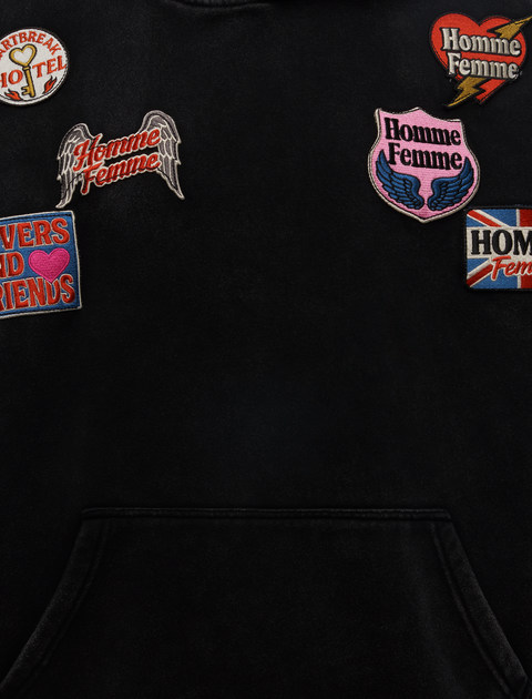 Black streetwear hoodie with colorful embroidered patches and front pocket