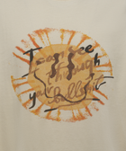 White streetwear t-shirt with orange sunburst graphic and abstract text on front