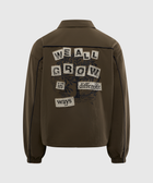 Brown men's streetwear jacket with 'We All Grow in Different Ways' graphic on back.