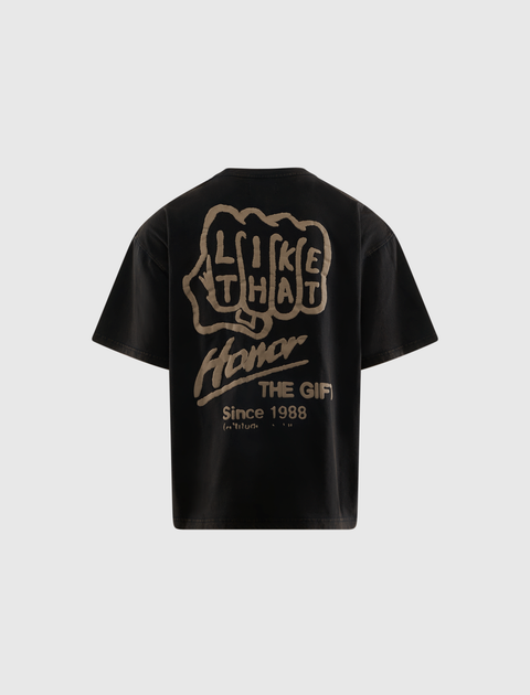 Black streetwear t-shirt with bold beige graphic and text on the back, casual men's apparel