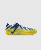 Men's sneaker with blue, white, and yellow gradient design, textured sole, side view