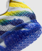Close-up of a multicolor athletic sneaker heel with textured blue rubber outsole