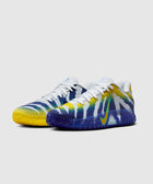 White, blue, and yellow men's sneakers with gradient sole and bold stripe pattern