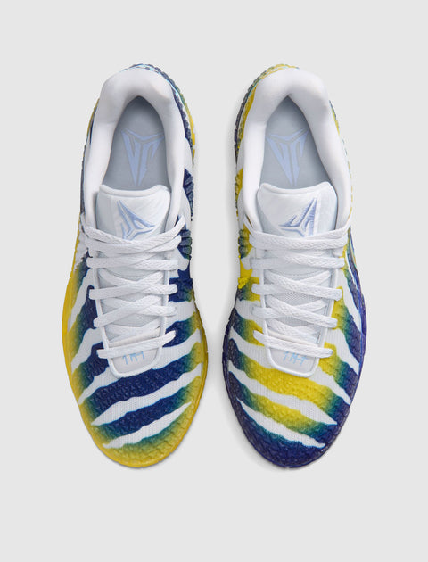 Top view of colorful men's sneakers with blue, yellow, and white striped pattern