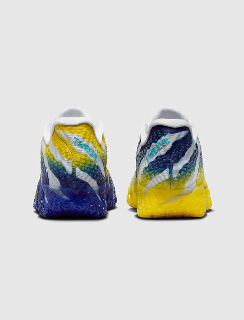 Colorful men's sneakers with gradient yellow, blue, and white design, rear view