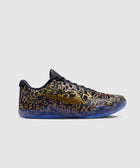 Black and gold low-top sneaker with metallic swoosh and abstract graphic pattern