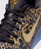 Black and gold basketball sneaker with abstract gold details, mesh upper, and gold swoosh logo