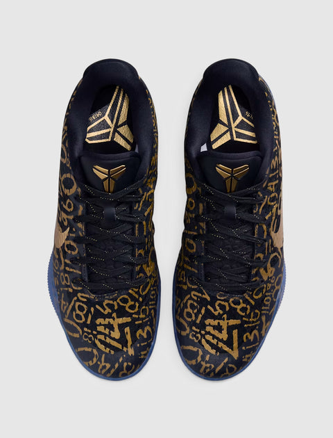 Black and gold patterned basketball sneakers with abstract numbers and metallic accents, top view