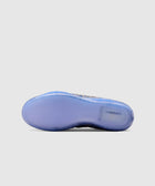 Icy blue translucent sneaker sole with visible Zoom Air unit, streetwear footwear