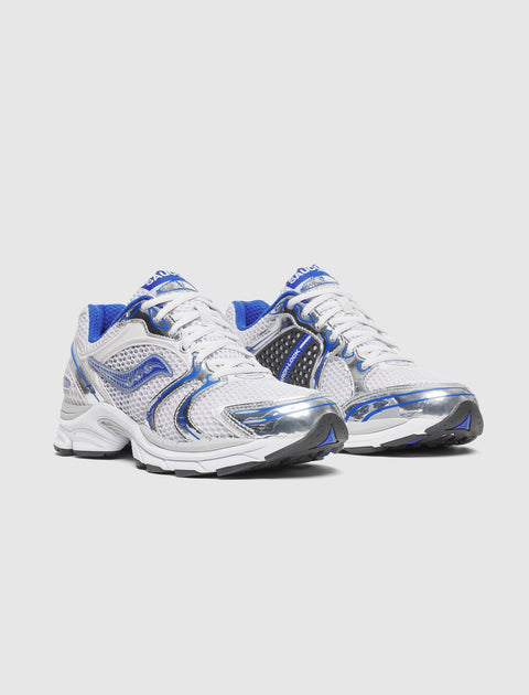 White and blue mesh sneakers with metallic silver accents and chunky soles on a plain background