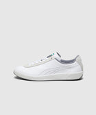 White low-top sneaker with perforated sides, suede accents, and grey detailing on heel