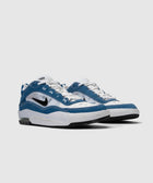 Blue and white Nike Air sneakers with black swoosh, white laces, and visible Air unit