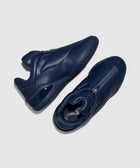Men's navy blue leather sneakers with zipper detail, modern streetwear footwear