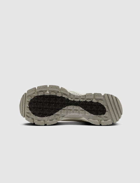 Men's sneaker outsole with textured black and grey tread, streetwear footwear