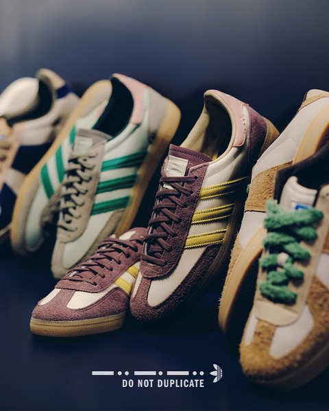 Men's streetwear sneakers in various suede and leather designs with colored stripes on dark background